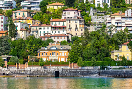 View of the beautiful architecture and Lake Como in Italian Alpsの写真素材