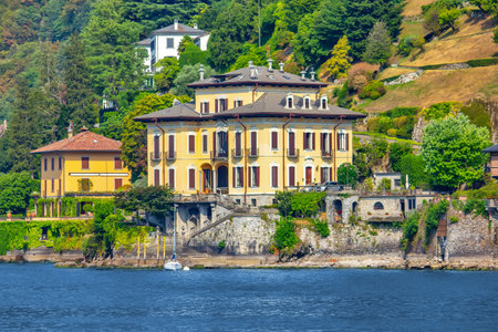 View of the beautiful architecture and Lake Como in Italian Alpsの写真素材