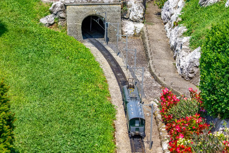 Miniature Train entering in the Stone Tunnelの写真素材