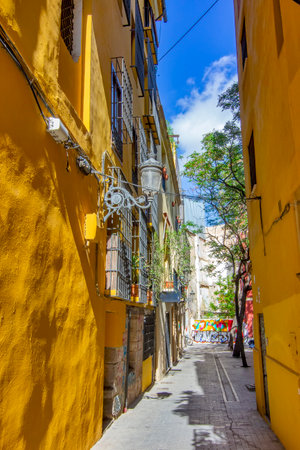 A picturesque street showcasing Valencia's vibrant architecture and urban beauty.の写真素材