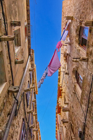 Angle view of the narrow street in Dubrovnik, Croatiaの写真素材