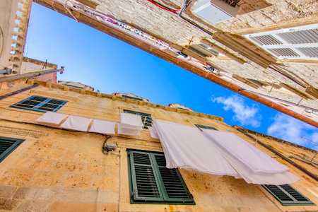 Angle view of the narrow street in Dubrovnik, Croatiaの写真素材