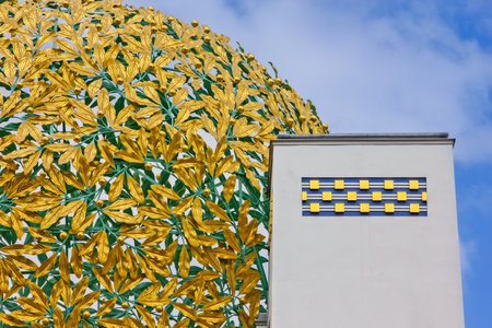 close-up view of the iconic, gilded leaf dome - the golden cabbage - of the Art Nouveau Secession Building in Viennaの写真素材