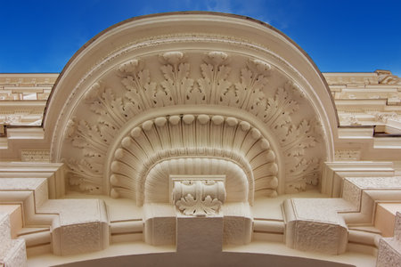 An ornate, low-angle view of a classic Vienna building facade