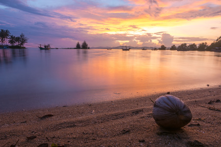 Beautiful sunset on the beach in Ban Saphan,Thailandの写真素材