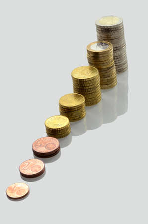 Isolated stack of Euro coins with reflection.の写真素材