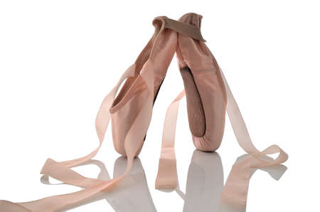 Ballet shoes on point isolated on a white background の写真素材