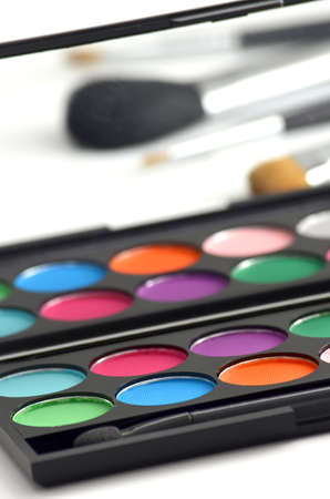 Makeup palette with brushes in the mirror の写真素材