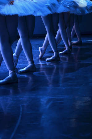 Ballet performance of Swan lake, detail of ballerinas pointe shoes の写真素材