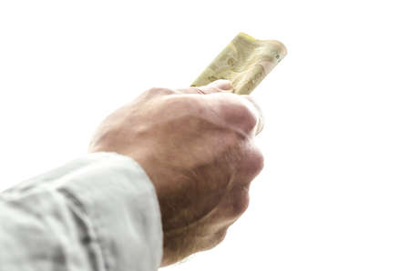 Male hand giving money  Isolated over white background の写真素材
