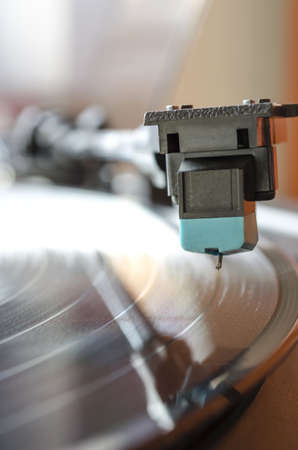 Gramophone record player with focus on the needle head  の写真素材