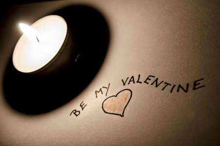Be my Valentine note by the candle light  A nice Valentine concept の写真素材