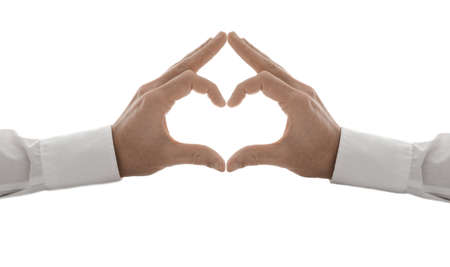 Hands in the form of a heart  Isolated on a white background の写真素材