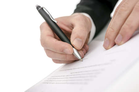Cropped view of a business man signing a contract  Shallow focus on signature  の写真素材