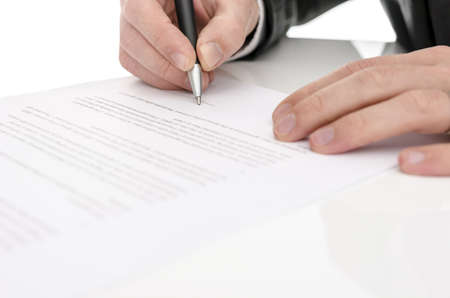 Closeup of a man signing a contract  Selective focus の写真素材