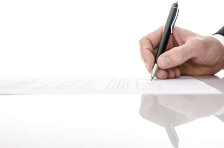 Signing a contract on a white table  With copy space  