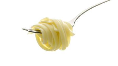 Spaghetti on a fork  Isolated on a white background の写真素材