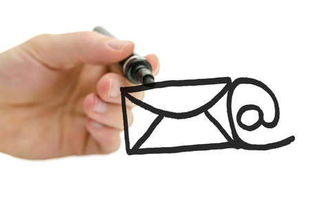 Hand drawing envelope and @ sign on virtual white board. Email concept.の写真素材