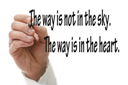 Writing famous Buddha quote on virtual whiteboard.の写真素材