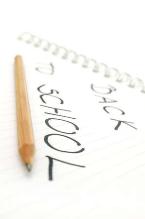 Side view of Back to School text written in spiral notebook. Shallow dof.の写真素材