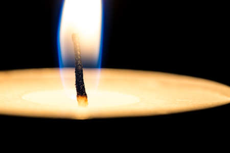 Macro shot of burning candle.