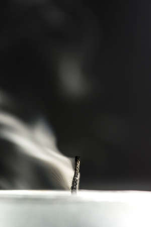 Closeup of blown out candle.