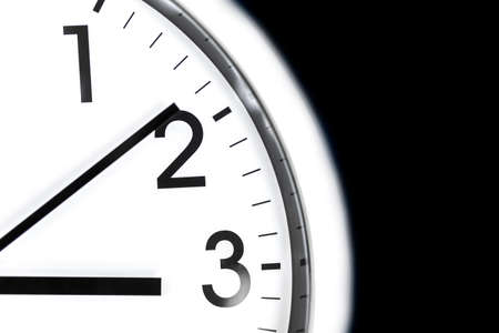 Wall clock face detail. Isolated over black background.