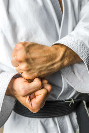 Closeup of karate fighter making fists.の写真素材