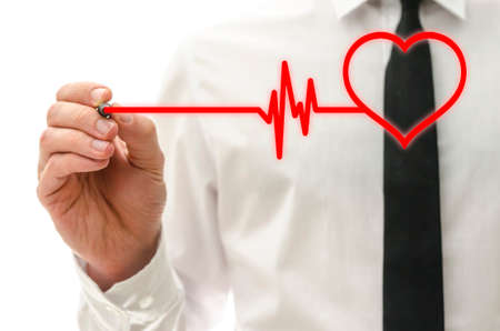 Drawing heart beating cardiograph on virtual screen.の写真素材