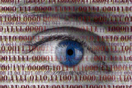 Closeup of human eye with digital binary code. Concept of internet spying.の写真素材