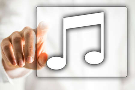 Musical notes icon on virtual screen.の写真素材