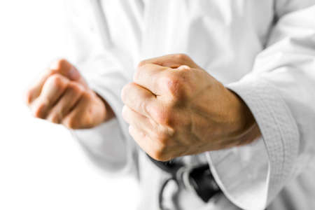 Fighter making a fist in the direction of the camera either as a belligerent combative gesture in...