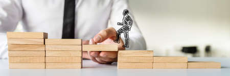 Wide view image of hand drawn shape of a businessman walking up the wooden steps supported by male...