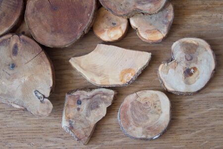 Wooden juniper rings as a stand under the hotの写真素材