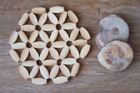 Wooden juniper rings and stand under the hotの写真素材