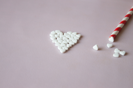Symbol heart from pills pink backgroundの写真素材