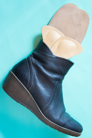 Leather black boots with orthopedic insoles.. Neutral background. Top view.の写真素材