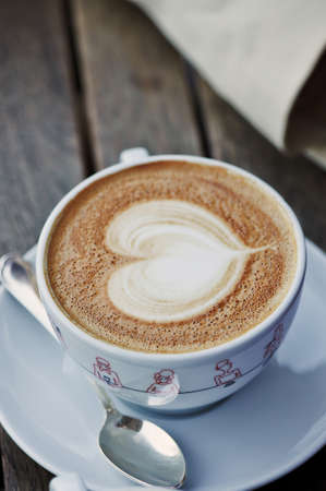 cup of hot coffee , cappuccino heart designの写真素材