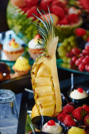 Dessert of pineapple at the wedding Banquetの写真素材