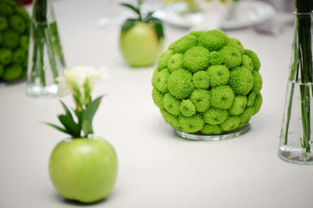 Green decorative floral decoration for wedding tableの写真素材