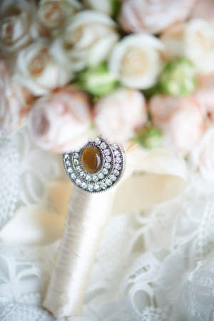 The bride's bouquet from the beautiful cream-colored rosesの写真素材