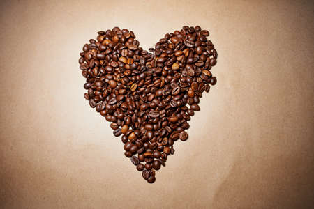 Coffee heart on brown old paper, loveの写真素材