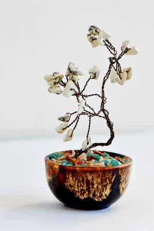 Stone tree. tree of happiness Feng Shui from a wire with white stonesの写真素材