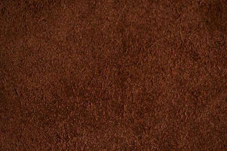 Brown suede closeup background.
