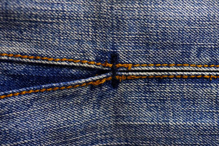 Blue denim jeans texture, background with stitchingの写真素材