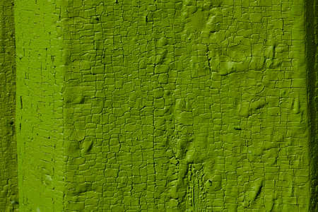 green flaky paint on a wooden fence.の写真素材