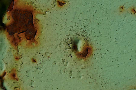 Grunge texture of green rusty metal with scratches