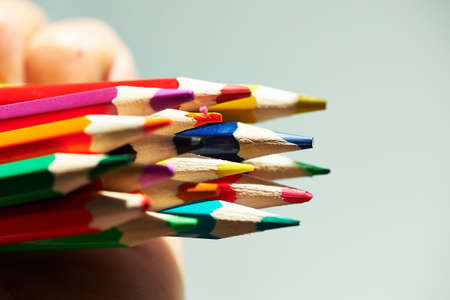 Colored pencils in children's hands, sharpened . Macroの写真素材