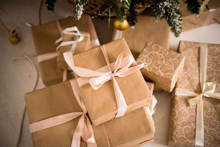 New year. Christmas gifts Packed in craftool paper. A sense of celebration