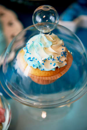 Sweet table for childrens birthday party in turquoise and purple. A sense of celebration, of joy. Beautiful sweetsの写真素材